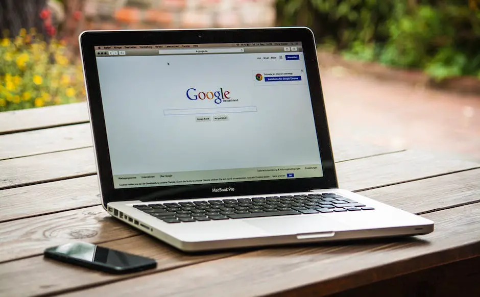 An image showing a person working on a laptop with Google Search Console displayed on the screen.